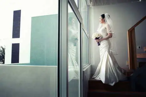 Gorgeous bride look down to the aisle before wedding.