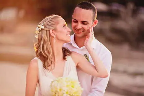 Romantic wedding couple photo on a beautiful beach of Koh Lanta.